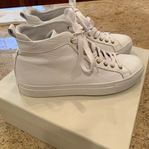 White leather high tops
